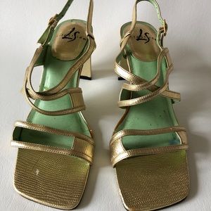 Make a bold statement in this metallic gold sandal!